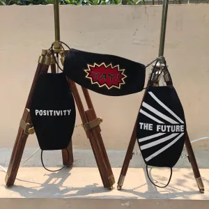 A Set of ‘The Future, ‘Yay’ and ‘Positivity’ Leather Masks.